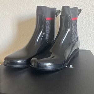 Coach Black and Red Sole Detail